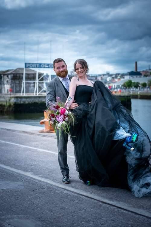 A stunning photo of the happy couple along Cork's docklands.