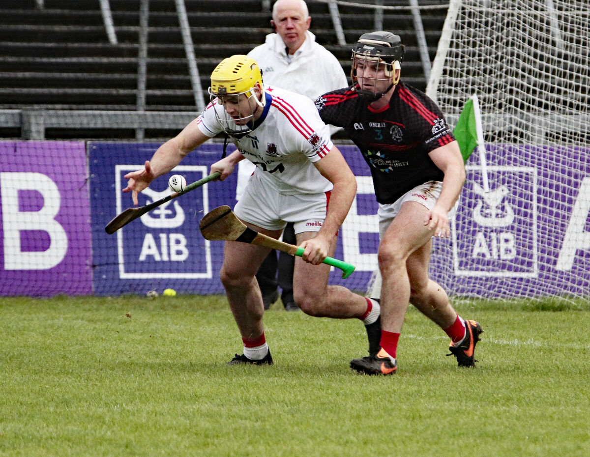 Sean Twomey, Courcey Rovers, takes on Ronan Kirby, Mungret St Paul's,  in the Munster semi-final. Picture: Brendan Gleeson