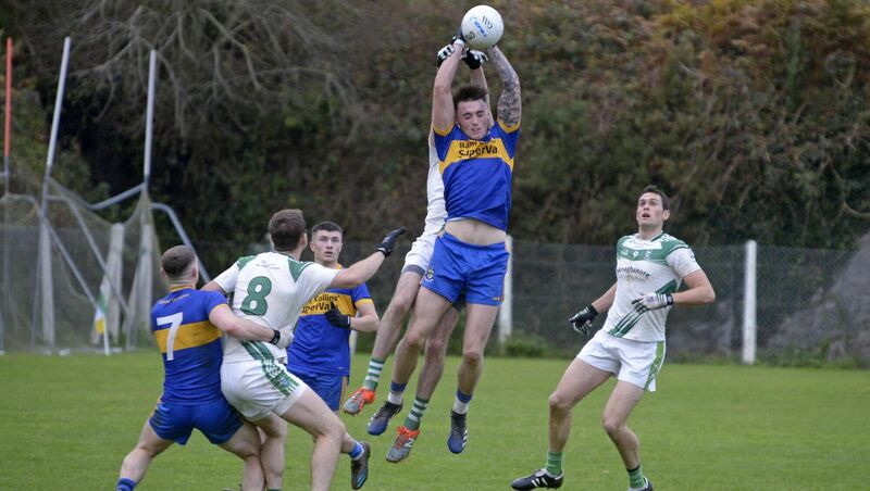 Ilen Rovers' Peter O'Driscoll jumping behind to steal the ball from Dan Greene, Carrigaline. Picture: Denis Boyle Ilen Rovers' Peter O'Driscoll jumping behind to steal the ball from Dan Greene, Carrigaline. Picture: Denis Boyle
