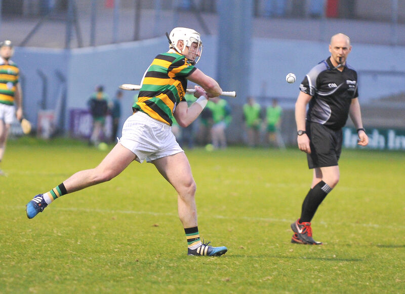 Referee Joe Larkin looks on as Glen Rovers' Patrick Horgan fires the ball over the bar against Bride Rovers, in their Cork SHC clash at Pairc Ui Rinn.