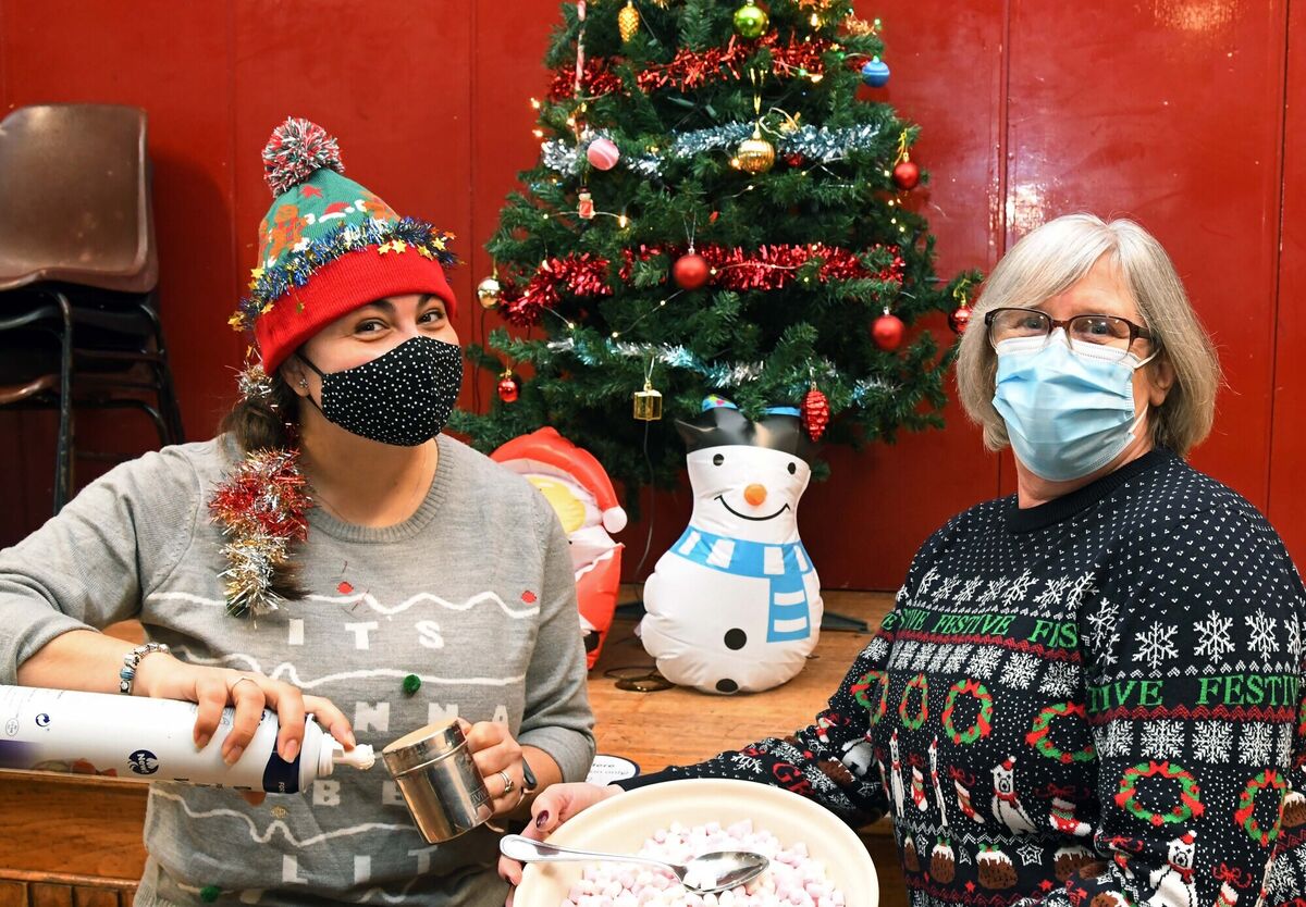Lucia Tari, teacher, (left) and Bernadette Roche of Le Caf Fe at the Christmas Jumper Day at Colaiste an Chroí Naofa, Carraig na bhFear, in aid of Concern celebrated with hot choclotate from Le Caf Fe for students and staff. Picture Denis Minihane. Lucia Tari, teacher, (left) and Bernadette Roche of Le Caf Fe at the Christmas Jumper Day at Colaiste an Chroí Naofa, Carraig na bhFear, in aid of Concern celebrated with hot choclotate from Le Caf Fe for students and staff. Picture Denis Minihane.