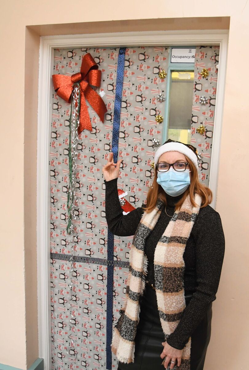 Marie Sheehan, deputy principal, next to one of the decorated classroom doors during the Christmas Jumper Day at Colaiste an Chroí Naofa, Carraig na bhFear, in aid of Concern celebrated with hot choclotate from Le Caf Fe for students and staff. Picture Denis Minihane. Marie Sheehan, deputy principal, next to one of the decorated classroom doors during the Christmas Jumper Day at Colaiste an Chroí Naofa, Carraig na bhFear, in aid of Concern celebrated with hot choclotate from Le Caf Fe for students and staff. Picture Denis Minihane.