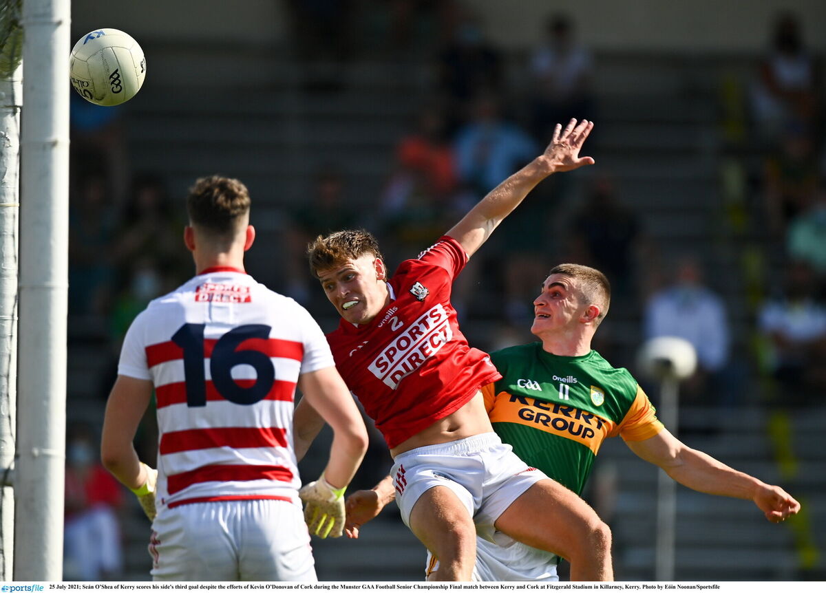 Seán O’Shea of Kerry scores his side's third goal despite the efforts of Kevin O’Donovan of Cork last summer. Picture: Eóin Noonan/Sportsfile