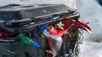 after Christmas trash bin close up