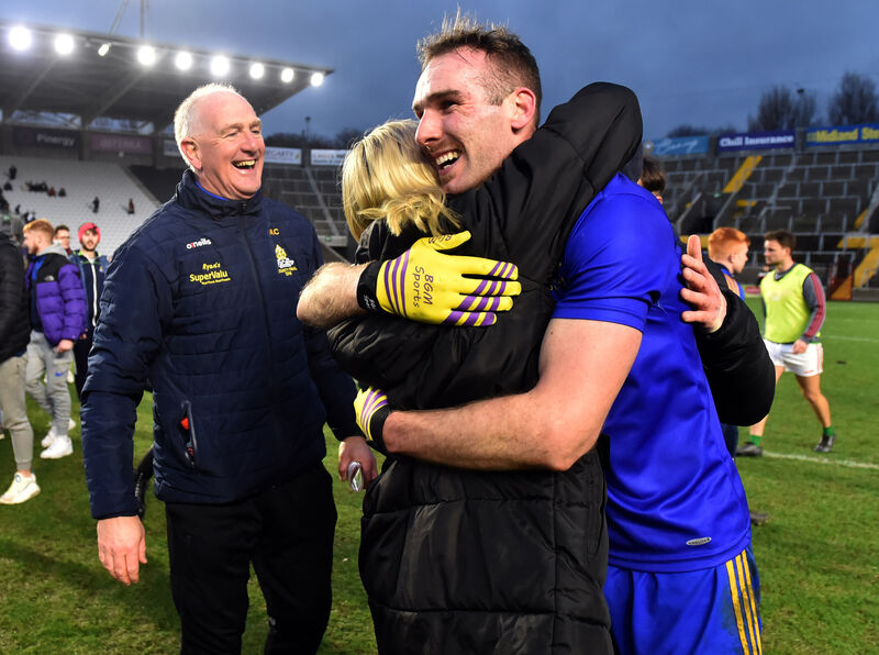 St Finbarr's selector Mick Comyns looks on as his son Eoin celebrates. Picture: Eddie O'Hare
