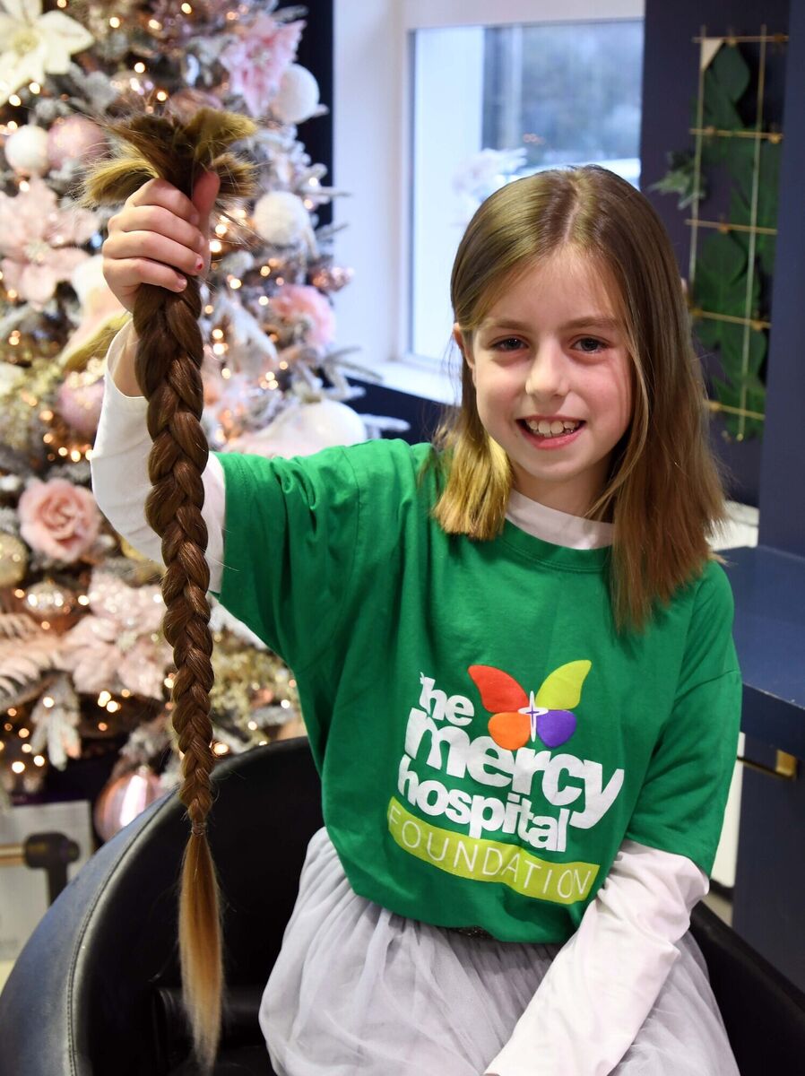 Kornelia withher ponytail, which will now be sent to the Rapunzel Foundation. Kornelia withher ponytail, which will now be sent to the Rapunzel Foundation.