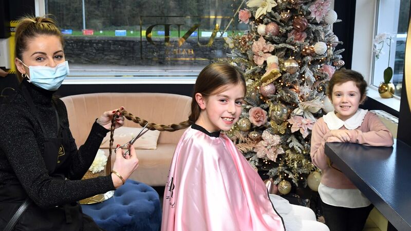 8-year-old inspired by friend cuts hair for charity