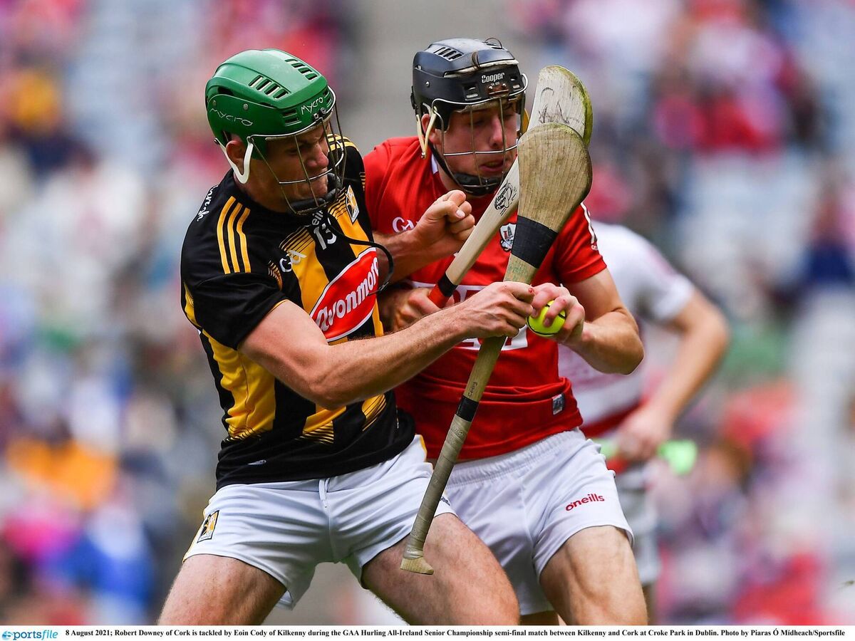 Robert Downey of Cork is tackled by Eoin Cody of Kilkenny at Croke Park. Picture: Piaras Ó Mídheach/Sportsfile