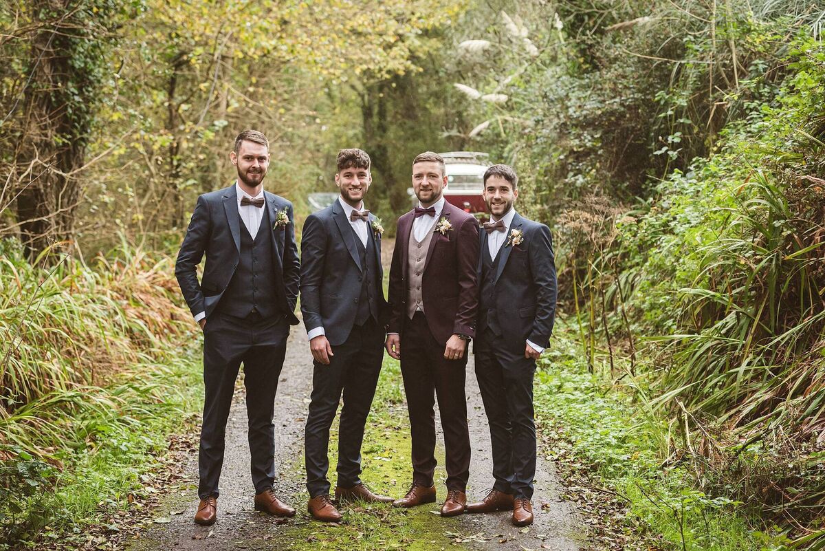 Danny had his two brothers, Seán and Rory O’ Connor, and his friend Brian Dunworth as his groomsmen. He wore a purple/ burgundy suit from Suit Distributors, with chain saw cufflinks, given to him by Sean. Danny had his two brothers, Seán and Rory O’ Connor, and his friend Brian Dunworth as his groomsmen. He wore a purple/ burgundy suit from Suit Distributors, with chain saw cufflinks, given to him by Sean.