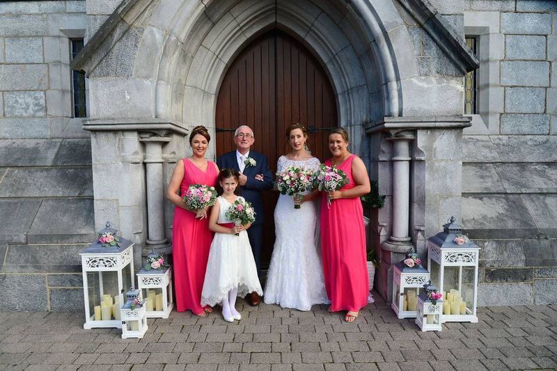 Bride Joanne O’Reilly with her father Pat and her bridesmaids Maria Fitzgerald and Kate McCormack and niece Sophie as flower girl.