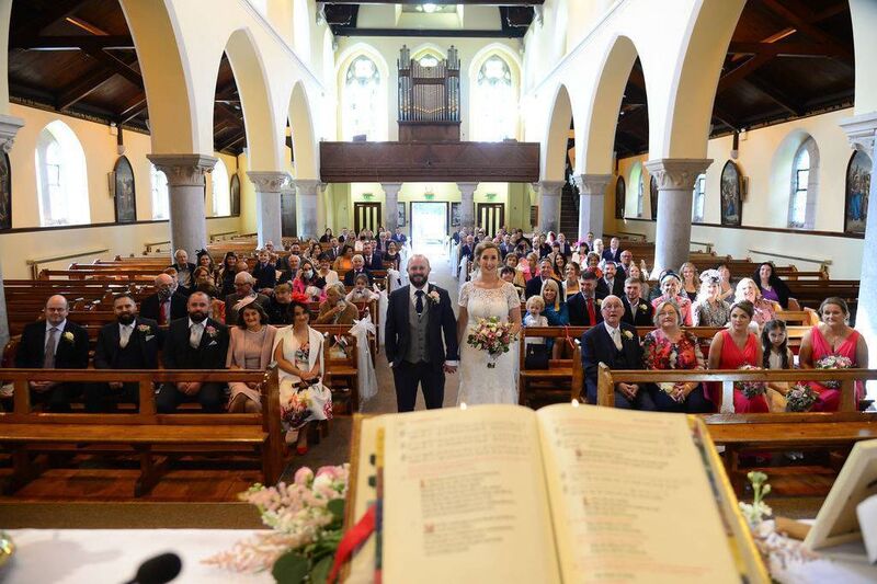 The wedding cake was made by the bride’s Aunt Mary (Flynn), iced by her friend Marie Deenihan, who also made a lemon drizzle cake.