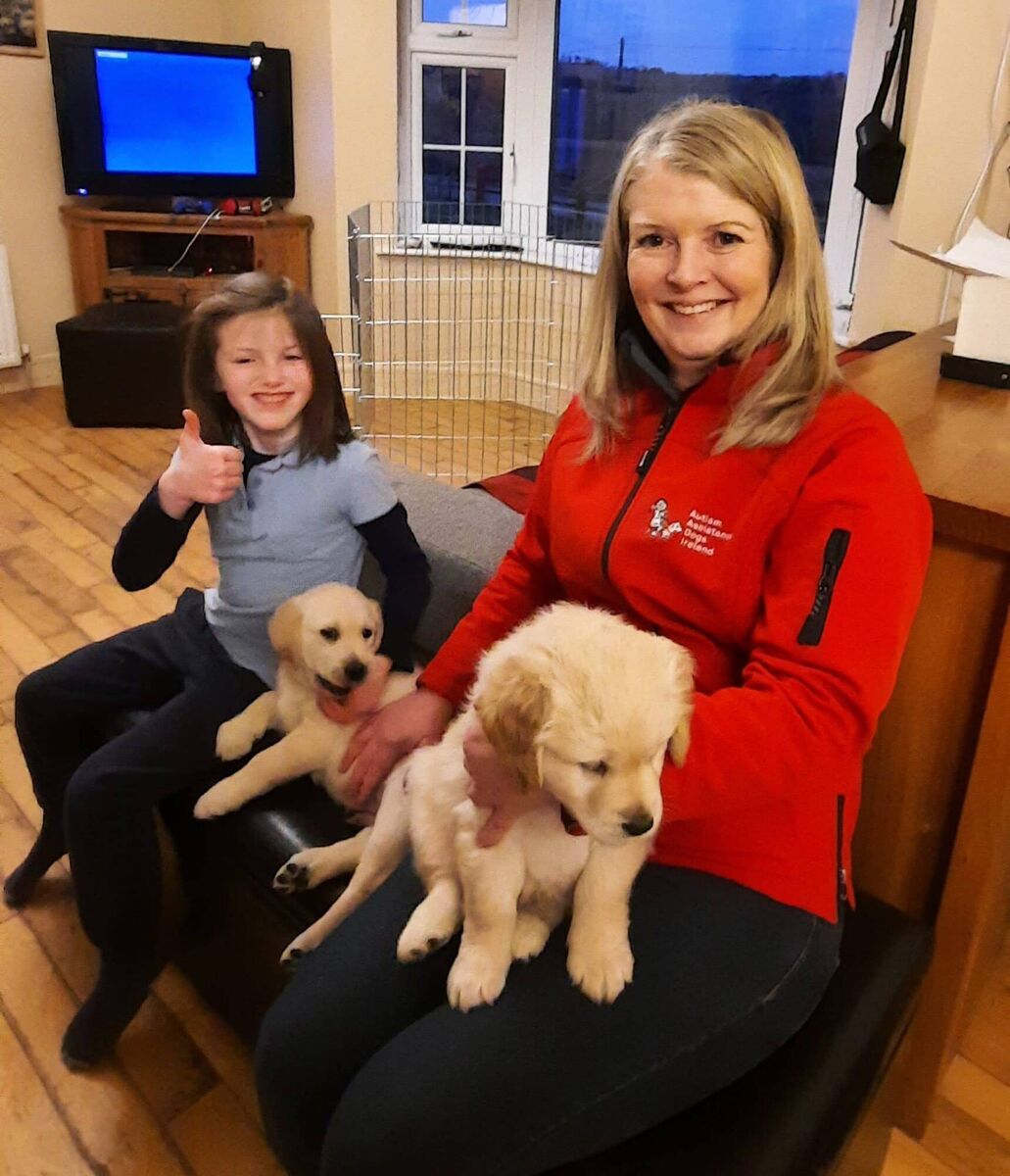 Nuala Geraghty of AADI with Laura Dolan and pups Kipper and Kodiak in Carrigadrohid, Co Cork