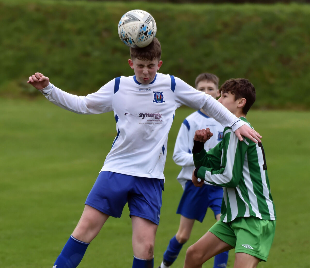 Leeds' Jamie O'Driscoll heads clear from Passage's Cathal Lee during the CSL U15 division 1 game at Leeds Park. Picture: Eddie O'Hare