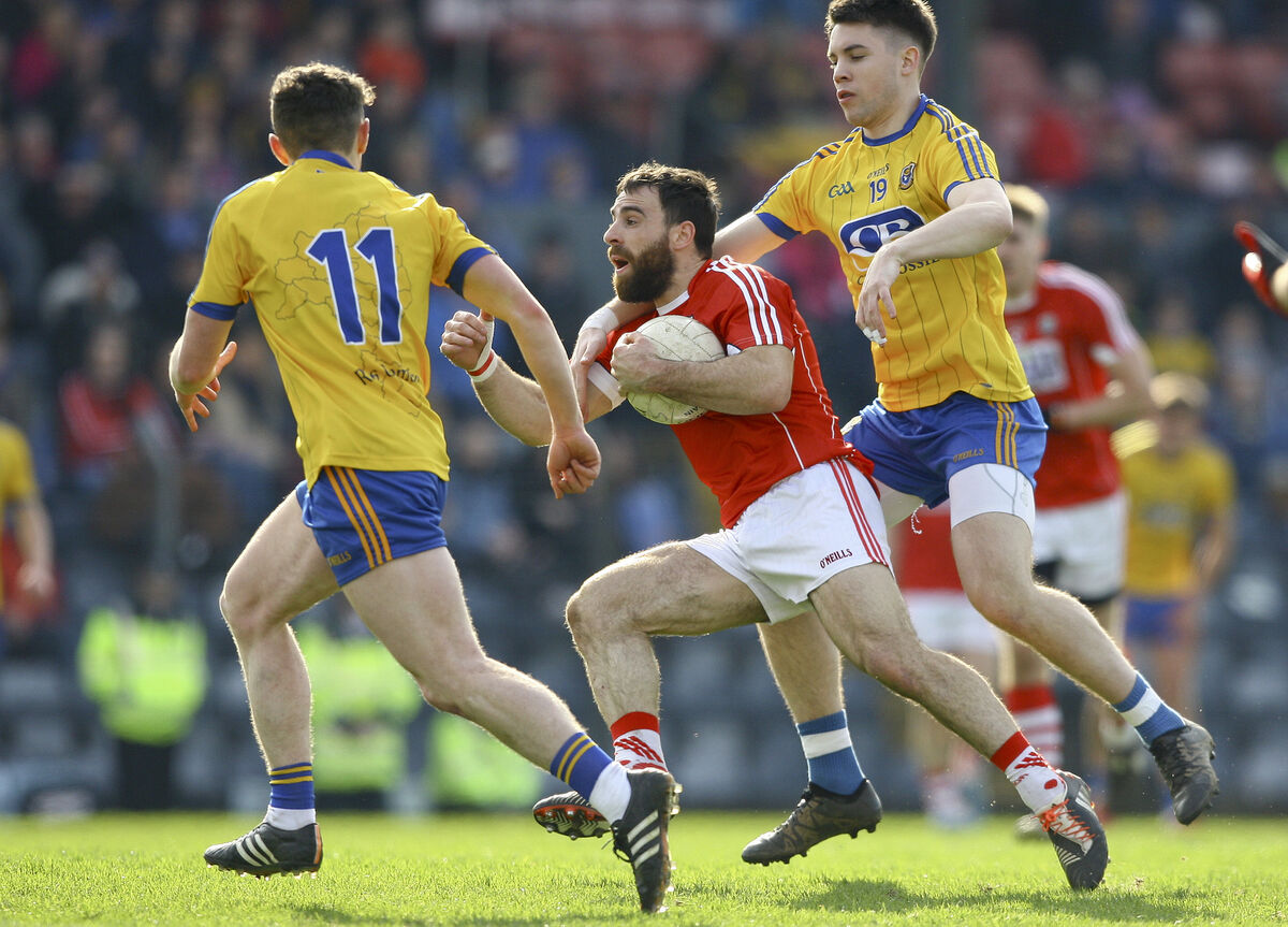 Colm O'Driscoll's progress is halted by Conor Daly as Roscommon captain Ciaráin Murtagh awaits developments in the 2016 league clash. Picture: INPHO/Ken Sutton Colm O'Driscoll's progress is halted by Conor Daly as Roscommon captain Ciaráin Murtagh awaits developments in the 2016 league clash. Picture: INPHO/Ken Sutton