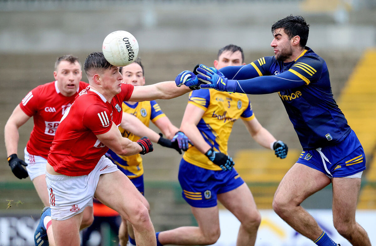 Cork's Colm O’Callaghan and Colm Lavin of Roscommon. Picture: INPHO/Bryan Keane Cork's Colm O’Callaghan and Colm Lavin of Roscommon. Picture: INPHO/Bryan Keane