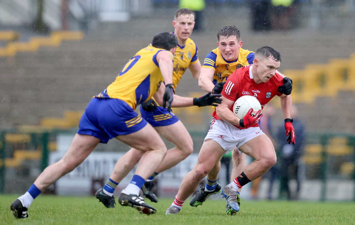 Roscommon's Dylan Ruane tackles Sean Powter of Cork. Picture: INPHO/Bryan Keane Roscommon's Dylan Ruane tackles Sean Powter of Cork. Picture: INPHO/Bryan Keane