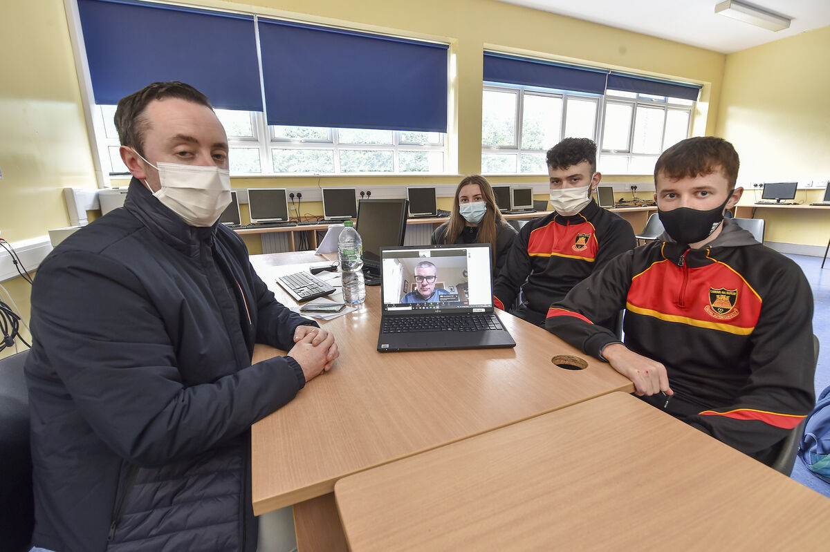  Colaiste and Chroí Naofa, Carrignavar sixth year pupils Grace Doran, Brendan Quain and Stephen Whooly with geography teacher Andrew Barry speaking to the Echo reporter John Bohane on the changes to this year's leaving cert exams. Picture Dan Linehan