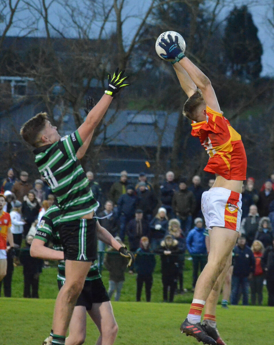 Jack Murphy gathers the ball ahead of Brendan Powter of Douglas during the P1 minor final in 2017. Picture: Howard Crowdy Jack Murphy gathers the ball ahead of Brendan Powter of Douglas during the P1 minor final in 2017. Picture: Howard Crowdy