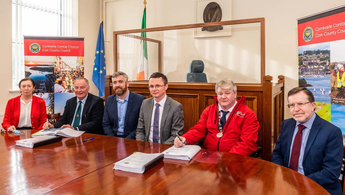 Witnessing the signing are Clodagh Henehan, Divisional Manager, Cork County Council; Maurice O'Donoghue, Director of JB Barry & Partners Ltd; Christopher O'Sullivan TD; Minister Patrick O'Donovan; Patrick Murphy, Deputy Mayor and Kevin Morey, Director of Water Engineers, County Cork. Picture: Andy Gibson. Witnessing the signing are Clodagh Henehan, Divisional Manager, Cork County Council; Maurice O'Donoghue, Director of JB Barry & Partners Ltd; Christopher O'Sullivan TD; Minister Patrick O'Donovan; Patrick Murphy, Deputy Mayor and Kevin Morey, Director of Water Engineers, County Cork. Picture: Andy Gibson.