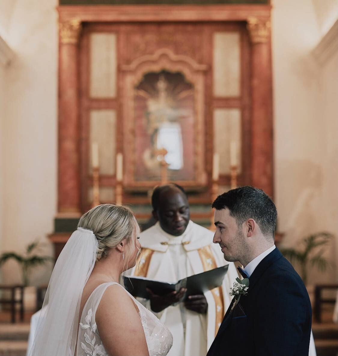 AN INTIMATE CEREMONY: The couple saying their vows, just the two of them. AN INTIMATE CEREMONY: The couple saying their vows, just the two of them.