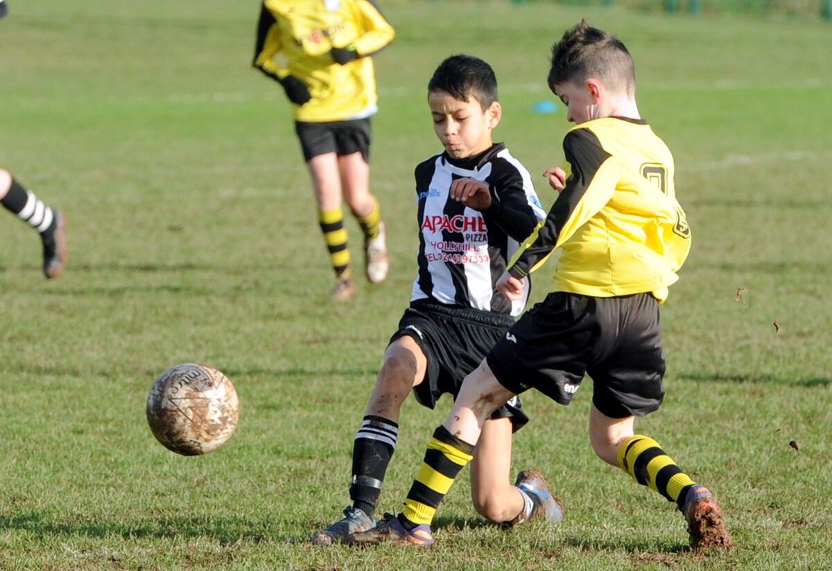 Riverstown's Oliver Yelverton manages to get his shot past Scott Twomey of St. Mary's in the Blackwater Motors Under 12 Local Cup at St. Mary's Park. 