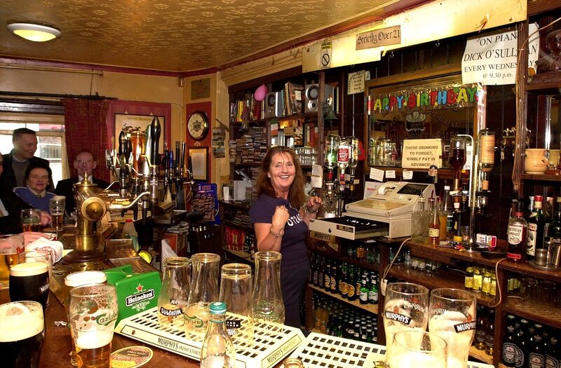 Esther Cotter serving behind the bar at the HI-B. during the Gramophone Circle meeting. Pic Pat Good.