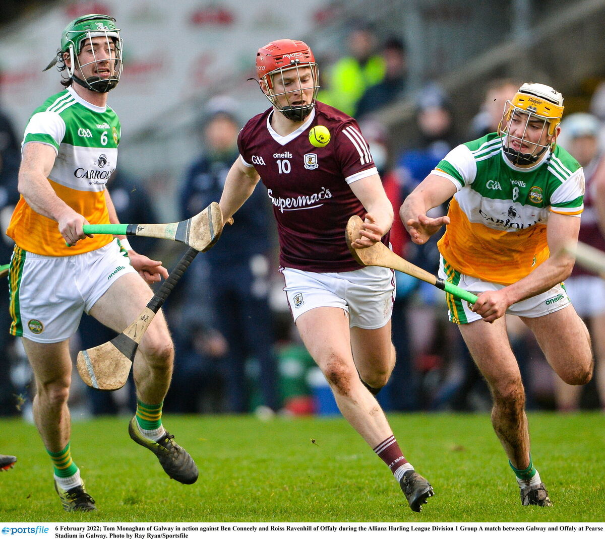 Tom Monaghan of Galway in action against Ben Conneely and Ross Ravenhill of Offaly. Picture: Ray Ryan/Sportsfile