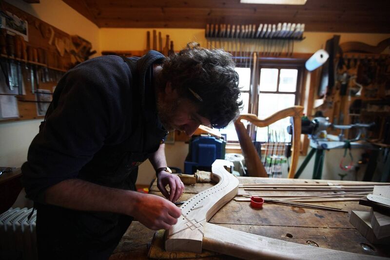 Kevin says that building a harp from scratch takes a month.