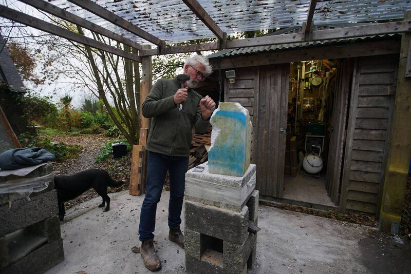 Michael Quane works on a stone in his home workshop in Cork. Picture: Mostafa Darwish 