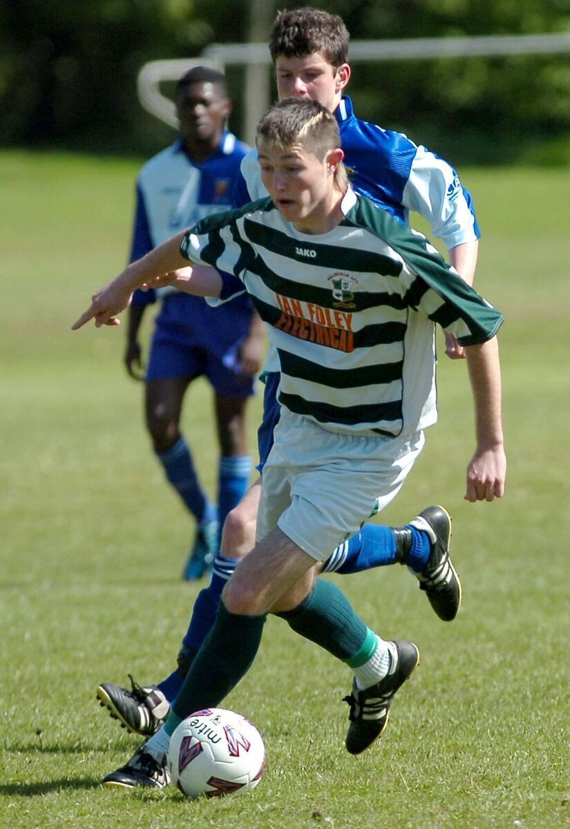 Ballincollig's Ryan Hogan keeping the ball from Corinthian Boys' Evan Bourne during the Umbro U16 Premier game in the Regional Park. Picture: Richard Mills