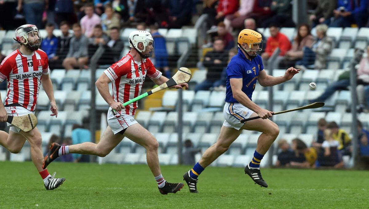 St Finbarr's Billy Hennessy racing away from Imokilly's John Cronin and Paudie O'Sullivan. Picture: Eddie O'Hare St Finbarr's Billy Hennessy racing away from Imokilly's John Cronin and Paudie O'Sullivan. Picture: Eddie O'Hare