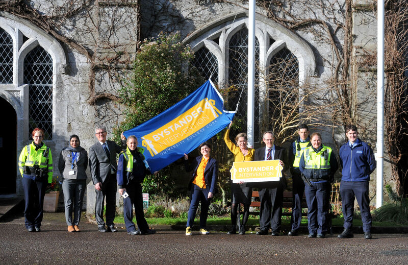 University College Cork (UCC) launching Bystander Intervention Week.(l to r) Community Garda Marie O'Neill, Fahmeda Naheed and Professor John O'Halloran, President, UCC, Garda Laura O'Connor, Alana Daly-Mulligan, Professor Louise Crowley, Bystander Intervention Programme Director, Stephen Byrne, Interim Registrar, UCC; Probationer Gardai David Driscoll and Barry O'Shea and r(second from right) Garda Kay Griffin, Community Policing raising the Bystander Intervention flag on Wednesday afternoon.Pic: Larry Cummins University College Cork (UCC) launching Bystander Intervention Week.(l to r) Community Garda Marie O'Neill, Fahmeda Naheed and Professor John O'Halloran, President, UCC, Garda Laura O'Connor, Alana Daly-Mulligan, Professor Louise Crowley, Bystander Intervention Programme Director, Stephen Byrne, Interim Registrar, UCC; Probationer Gardai David Driscoll and Barry O'Shea and r(second from right) Garda Kay Griffin, Community Policing raising the Bystander Intervention flag on Wednesday afternoon.Pic: Larry Cummins