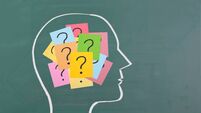 Human brain and colorful question mark