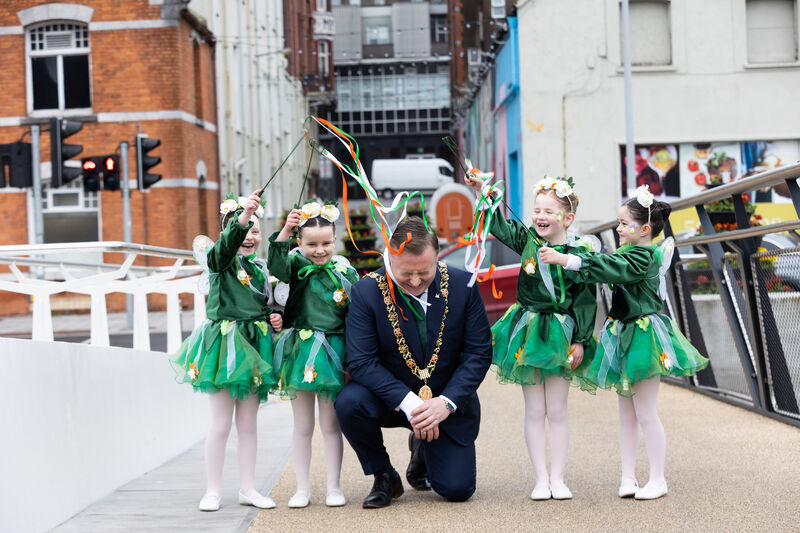 Lord Mayor Cllr Colm Kelleher with Olivia Forbes, Muireann Halley, Grace Hyde and Millie Ahern from the Joan Denise Moriarty School of Dance performing on the Mary Elmes Bridge at the launch of the Cork St Patrick's Festival which is organised by Cork City Council and takes place from March 17 to March 20. Picture: Darragh Kane