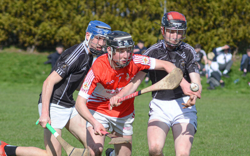 Midleton CBS's Conor Burns is challenged by St Francis College Rochestown players Bill Twohig and Conor Yelland. Picture: Howard Crowdy Midleton CBS's Conor Burns is challenged by St Francis College Rochestown players Bill Twohig and Conor Yelland. Picture: Howard Crowdy