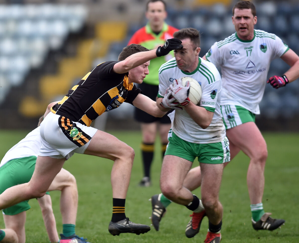 Muskerry's Brian Cronin is tackled by Avondhu's Liam Cronin during the 2019 SFC at Páirc Uí Rinn. Picture: Eddie O'Hare