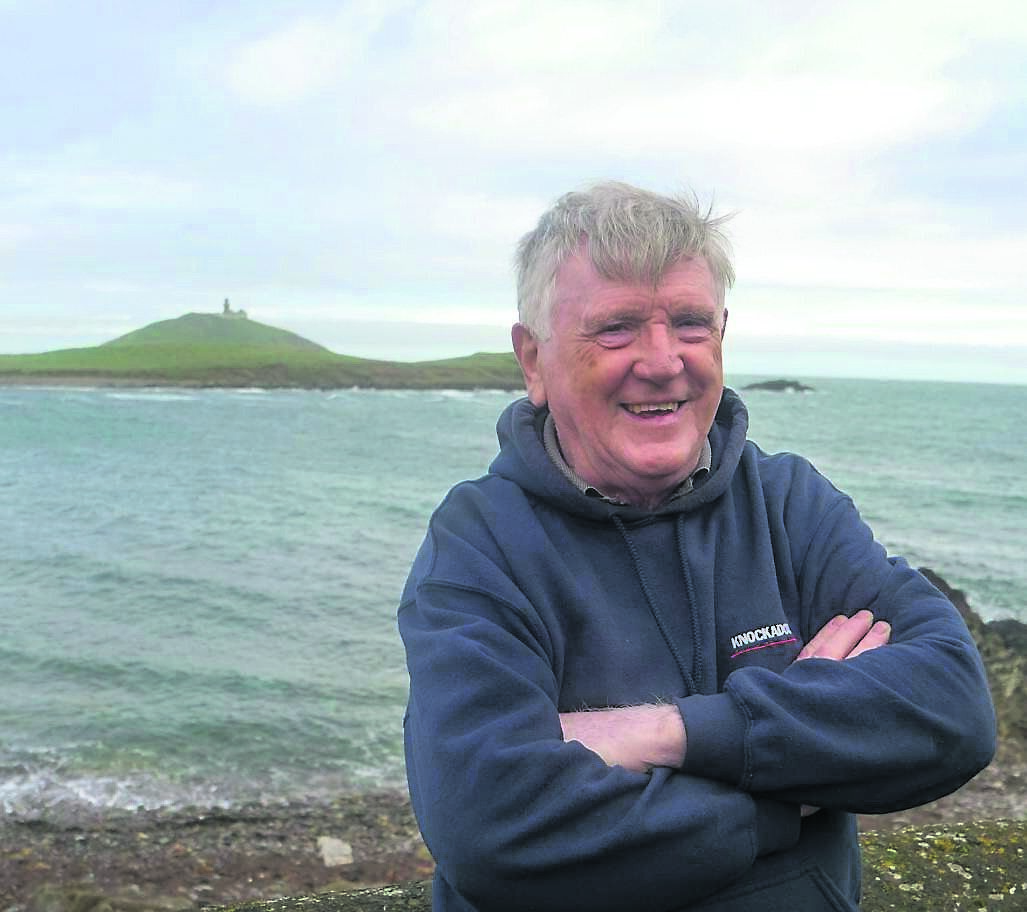 Eddie Fitzgerald with Ballycotton Lighthouse in the distance. Picture: Noel Sweeney