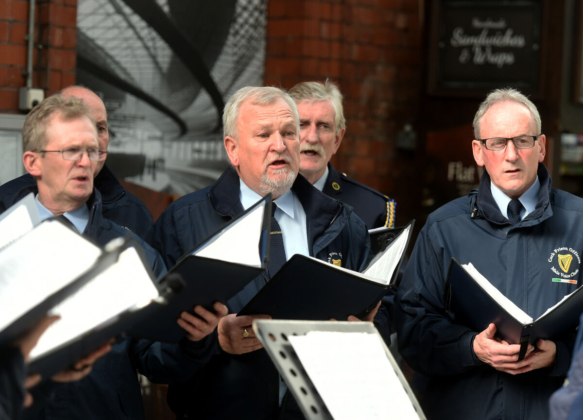 Members of Cork Prison Officer's Male Voice Choir perform as part of the BIG BUSK at Cork Kent Station, in aid of Focus Ireland on Friday 11th March 2022. Members of Cork Prison Officer's Male Voice Choir perform as part of the BIG BUSK at Cork Kent Station, in aid of Focus Ireland on Friday 11th March 2022.