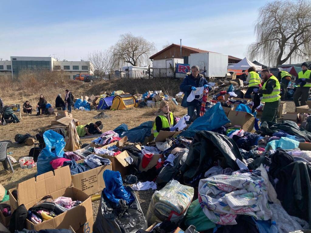 Volunteers cleaning waste ground beside the Medyka border crossing in Poland. Picture: Donal O'Keeffe Volunteers cleaning waste ground beside the Medyka border crossing in Poland. Picture: Donal O'Keeffe