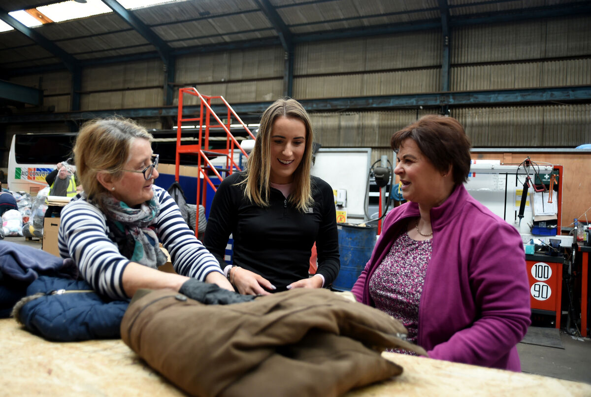  Volunteers Noreen Coleman, Aoife Healy and Miriam Dunton sorting donated items at the bus depot. Pic: Larry Cummins