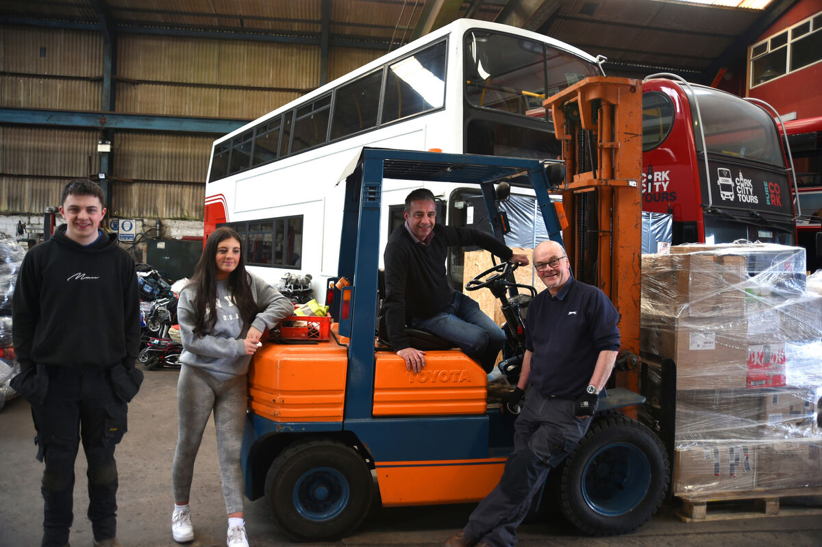  Volunteers Sean, Ella and John Quirke, transport manager and Niall Cronin, Cronin Coaches at the bus depot.Pic: Larry Cummins