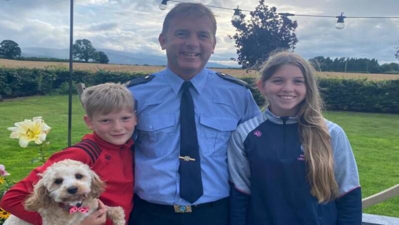 Garda Tadhg Mohally pictured at home with his family.