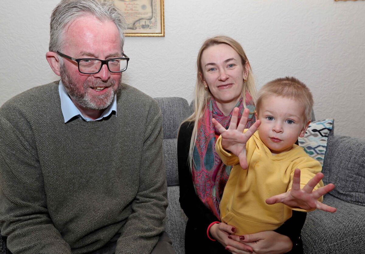 Donal O'Keeffe, reporter for The Echo with Larysa and Matviy Boryspolets. Picture: Jim Coughlan. Donal O'Keeffe, reporter for The Echo with Larysa and Matviy Boryspolets. Picture: Jim Coughlan.