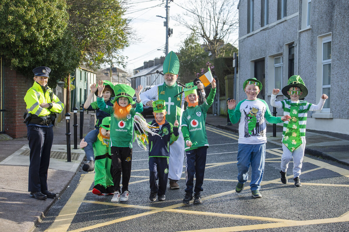 Garda Helen Courtney keeping an eye on the boys of St. Patrick's Boys National School, Gardiners Hill, Cork who took part in a combined 'Là Glas' day which started with a walk around the community. Included are pupils, Ethan, Kieran, Ross, Dan, Kevin and Sam with Frank Brady of the Ballyphehane Pipe Band. Picture Dan Linehan Garda Helen Courtney keeping an eye on the boys of St. Patrick's Boys National School, Gardiners Hill, Cork who took part in a combined 'Là Glas' day which started with a walk around the community. Included are pupils, Ethan, Kieran, Ross, Dan, Kevin and Sam with Frank Brady of the Ballyphehane Pipe Band. Picture Dan Linehan