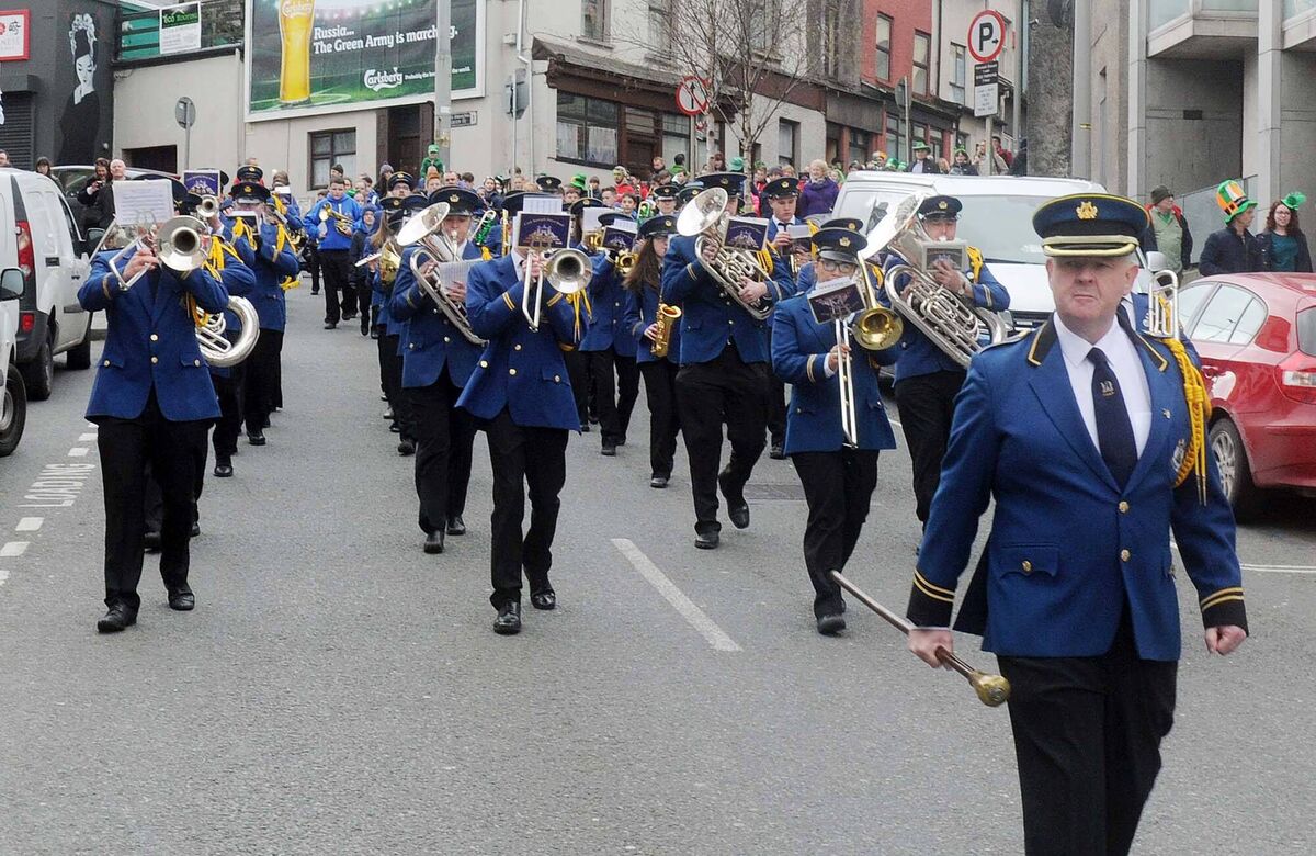 Members of the Barrack Street Senior Band, Youth Band and Junior Band, Cork, joined by young members of Mahon Community Concert Band, Cork, after walking down Barrack Street to take part in the St. Patrick's Day parade in Cork. Picture: Denis Minihane.