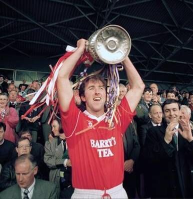 Cork captain Brian Corcoran - with then-Lord Mayor Micheál Martin watching on - lifts the National Hurling League trophy after victory over Wexford in a second replay in 1993. Picture: Ray McManus/Sportsfile