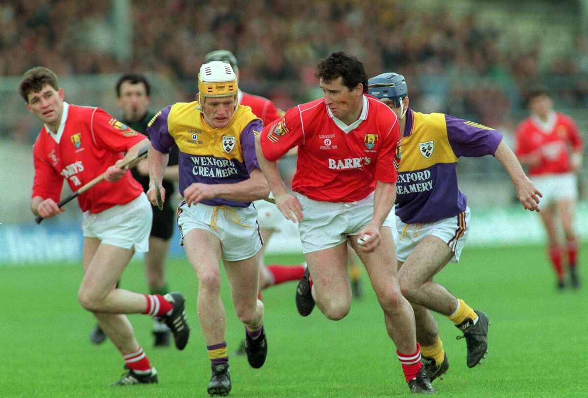 National Hurling League Final Wexford vs Cork 1993: Tomás Mulcahy of Cork runs on despite losing his hurley. Picture: INPHO