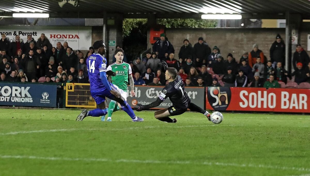 Ruairi Keating gets his shot past Kevin Joshua and Brian Murphy, Waterford, to score the first goal. Picture: Jim Coughlan.