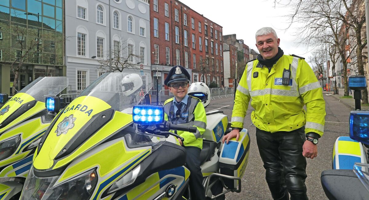  Cayden Dempsey with Garda Ollie Power, Roads Policing Unit Ballincollig. Picture: Jim Coughlan.