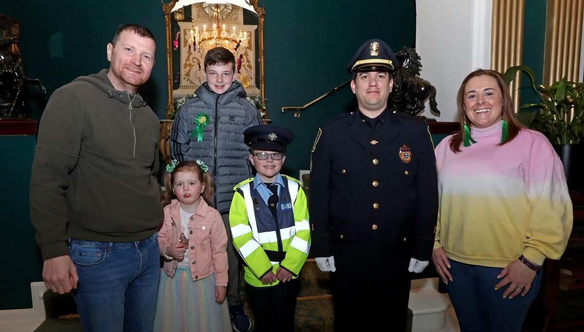 Cayden Dempsey with Sergeant Ken Runyan, Lynn Police Department, Massachusetts, also included are Cayden's family, dad, Aaron, sister, Reya, brother Nathan and mum, Lynsey. Picture: Jim Coughlan.
